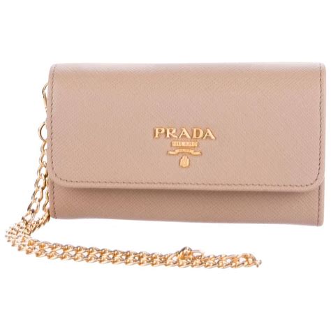 nude prada clutch